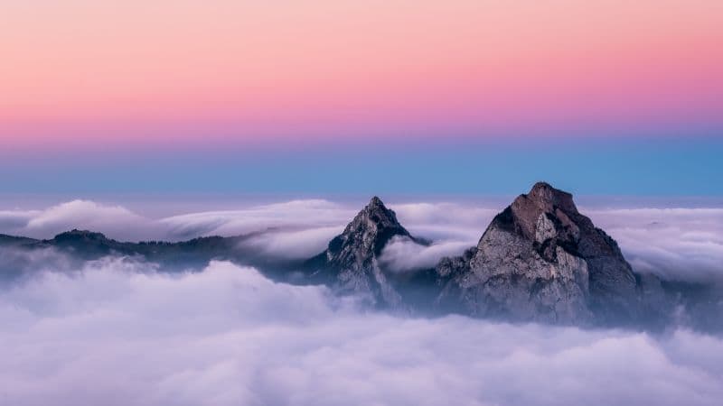 Mountain Peaks Above clouds Wallpaper