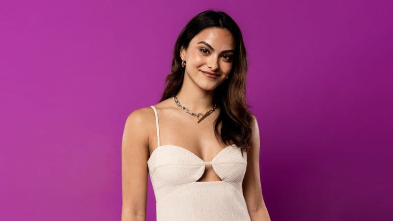 Camila Mendes Purple background Wallpaper
