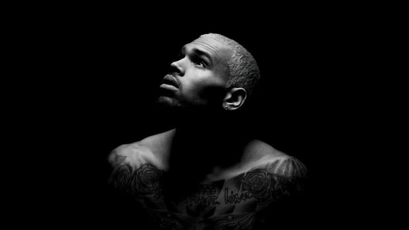 Chris Brown Black background Wallpaper
