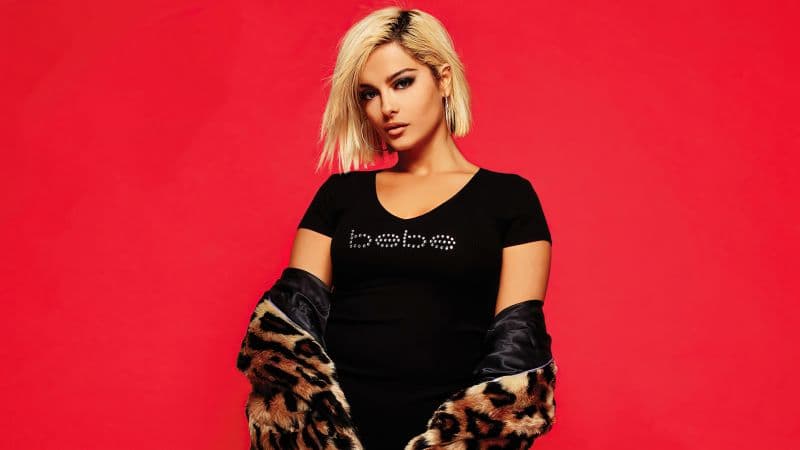 Bebe Rexha Red background Wallpaper