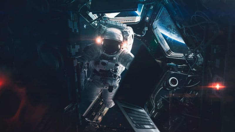 Astronaut Space station Wallpaper