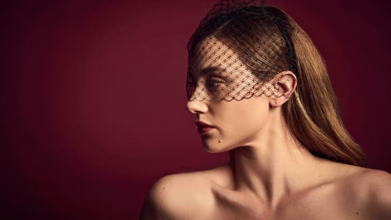 Lili Reinhart Red background Wallpaper