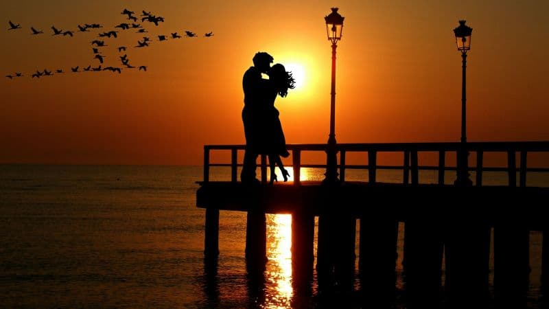 Couple Orange sky Wallpaper