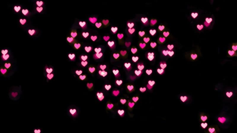 Pink hearts Black background Wallpaper