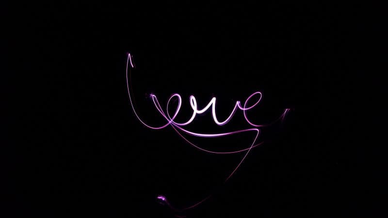 Love text Black background Wallpaper