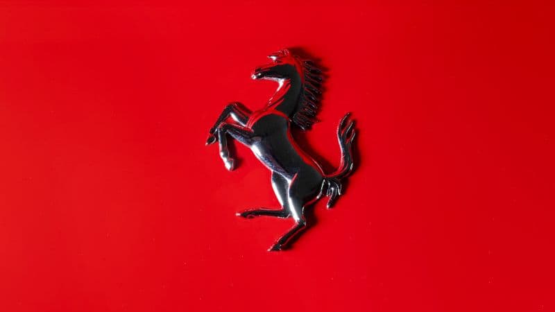 Ferrari logo Black prancing horse Wallpaper