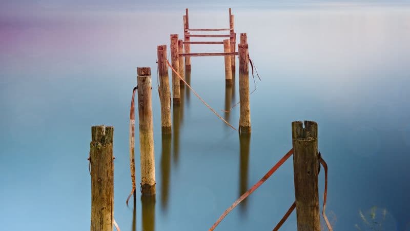 Broken Pier Body of Water Wallpaper