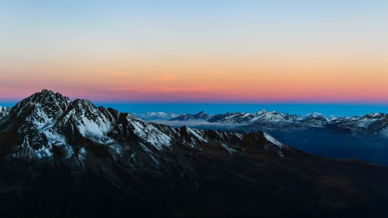 Snow covered Mountain range Wallpaper