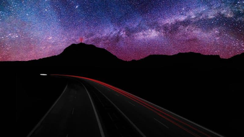 Mountain silhouette Light trails Wallpaper