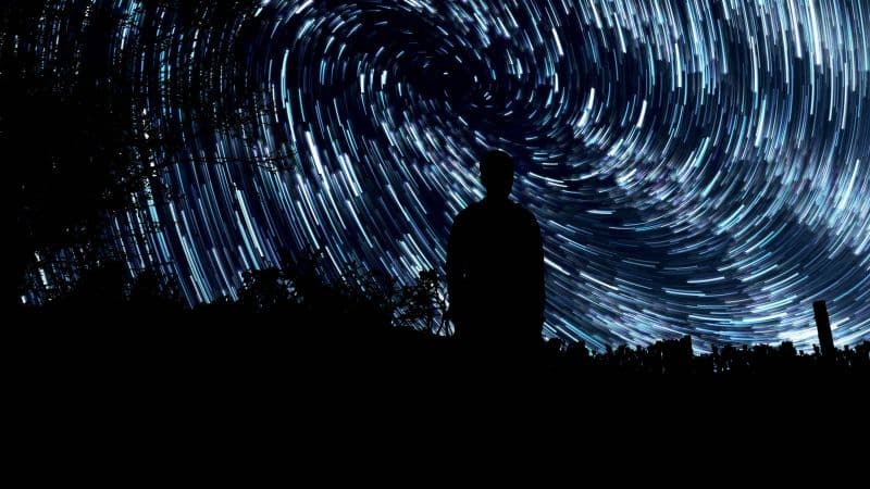 Star Trails Standing Man Wallpaper