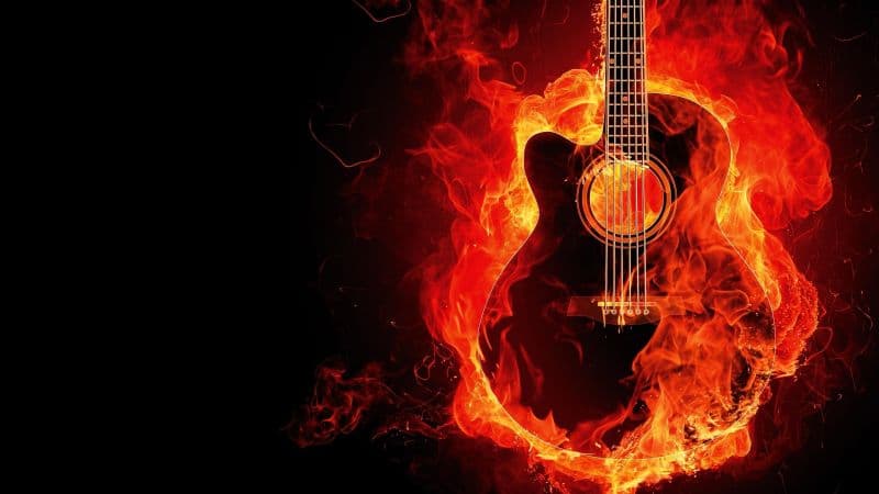 Flaming Guitar Black background Wallpaper