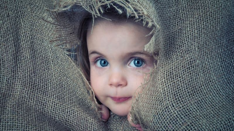 Cute boy Hiding Wallpaper