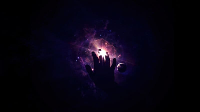 Hand Looking up at Sky Wallpaper