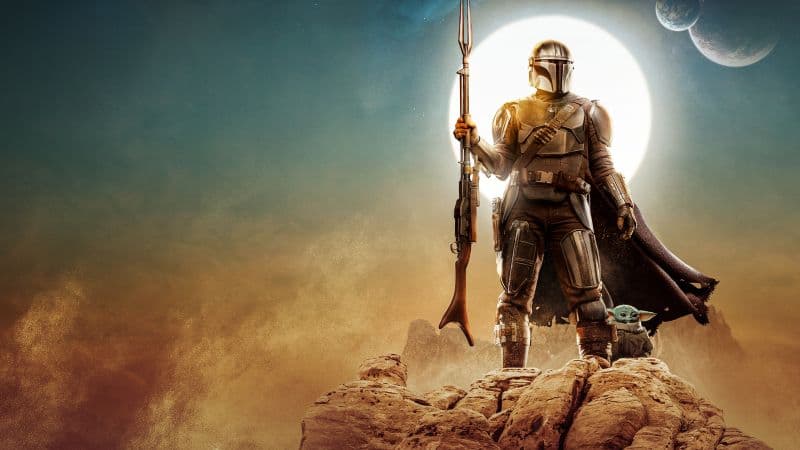 Din Djarin with Baby Yoda in The Mandalorian Season 2 Wallpaper