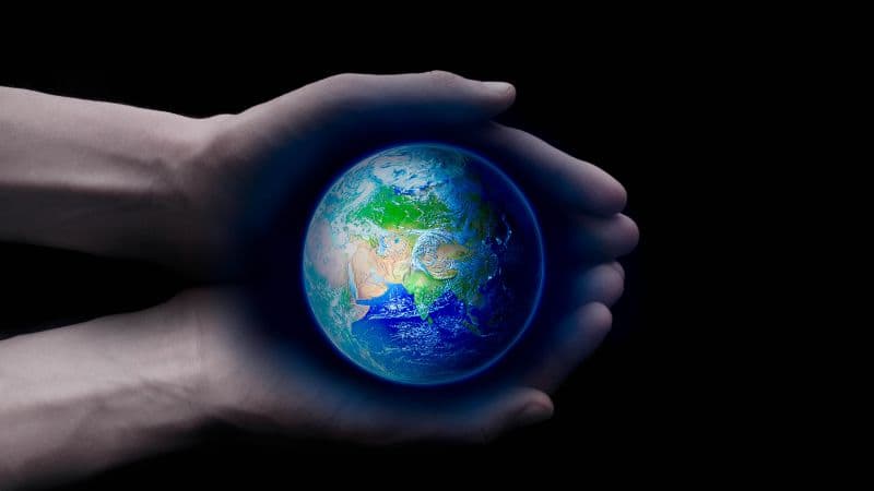 Planet Earth Holding hands Wallpaper