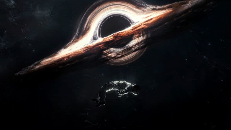 Gargantua black hole Astronaut Wallpaper